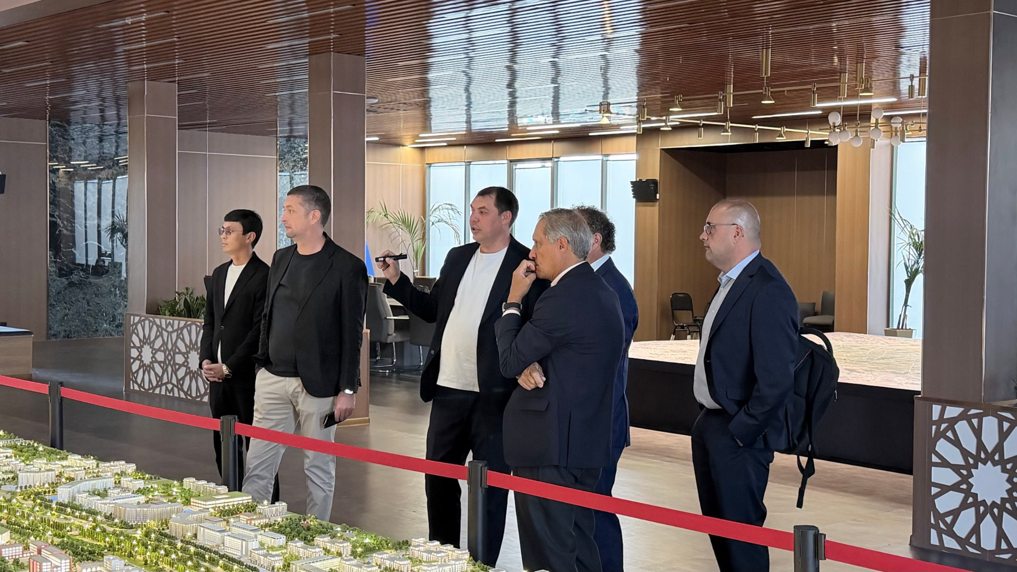 Barceló Group delegation beside the New Tashkent model